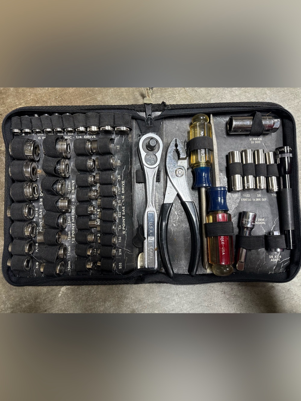 Sears Craftsman 55-piece mechanics tool set and a MAGLITE